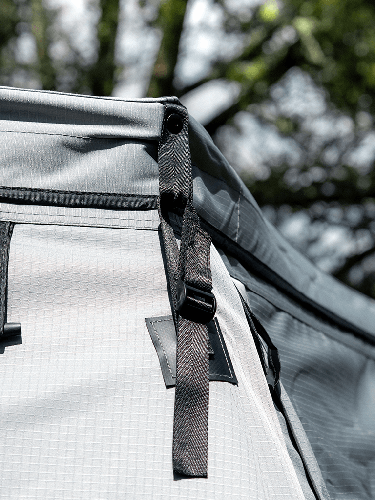 Close up view of the Lucas Creek 180 Fantail free standing awning with the outer wall kit installed - highlighting the straps that mean this won’t blow off in heavy winds!