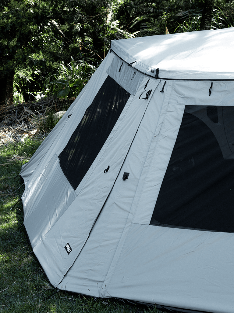 Close up view of the Lucas Creek 180 Fantail free standing awning with the outer wall kit installed