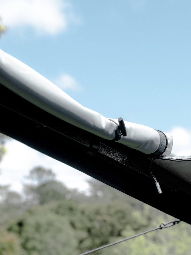 Roof hatch model showing the hatch fully open and rolled up and toggled