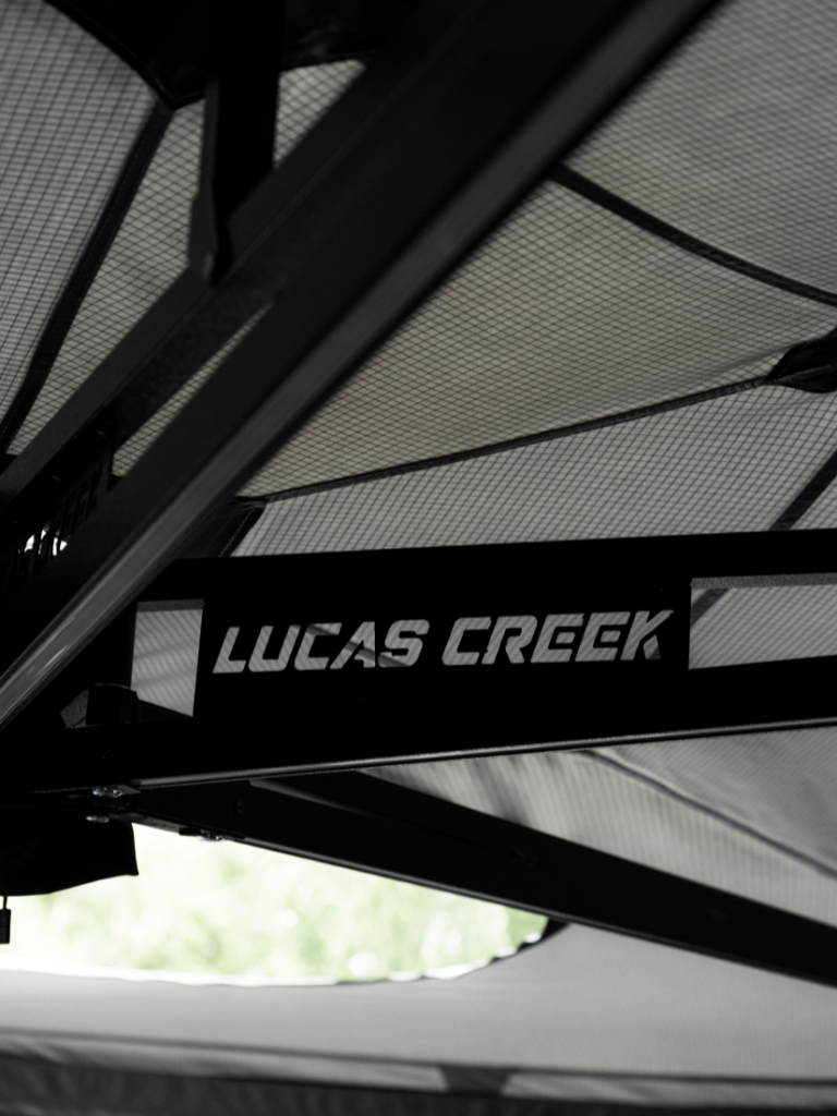 Lucas Creek 270 Freestanding awning double truss arms with logo