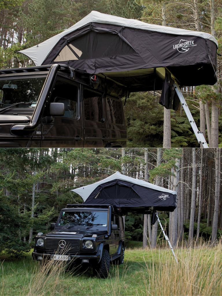 Lucas Creek soft shell rooftop tent open on a vehicle with windows rolled up in an outdoor forrest camping environment