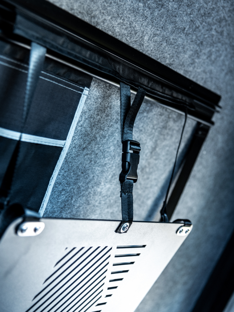 Photo of the optional drop down aluminium table stowed - great for watching movies on the laptop or for drinks inside the tent