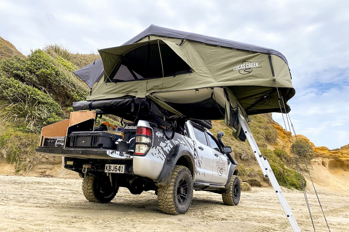 Lucas Creek Roof Top Tent on beach with window open